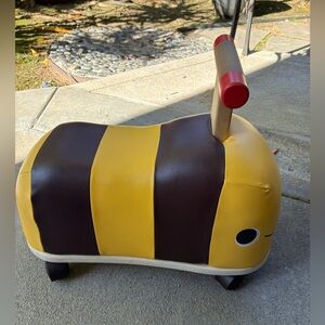 B. You Wooden Bee Ride-On Toy Buggy for Kids. Lightly used, almost new.